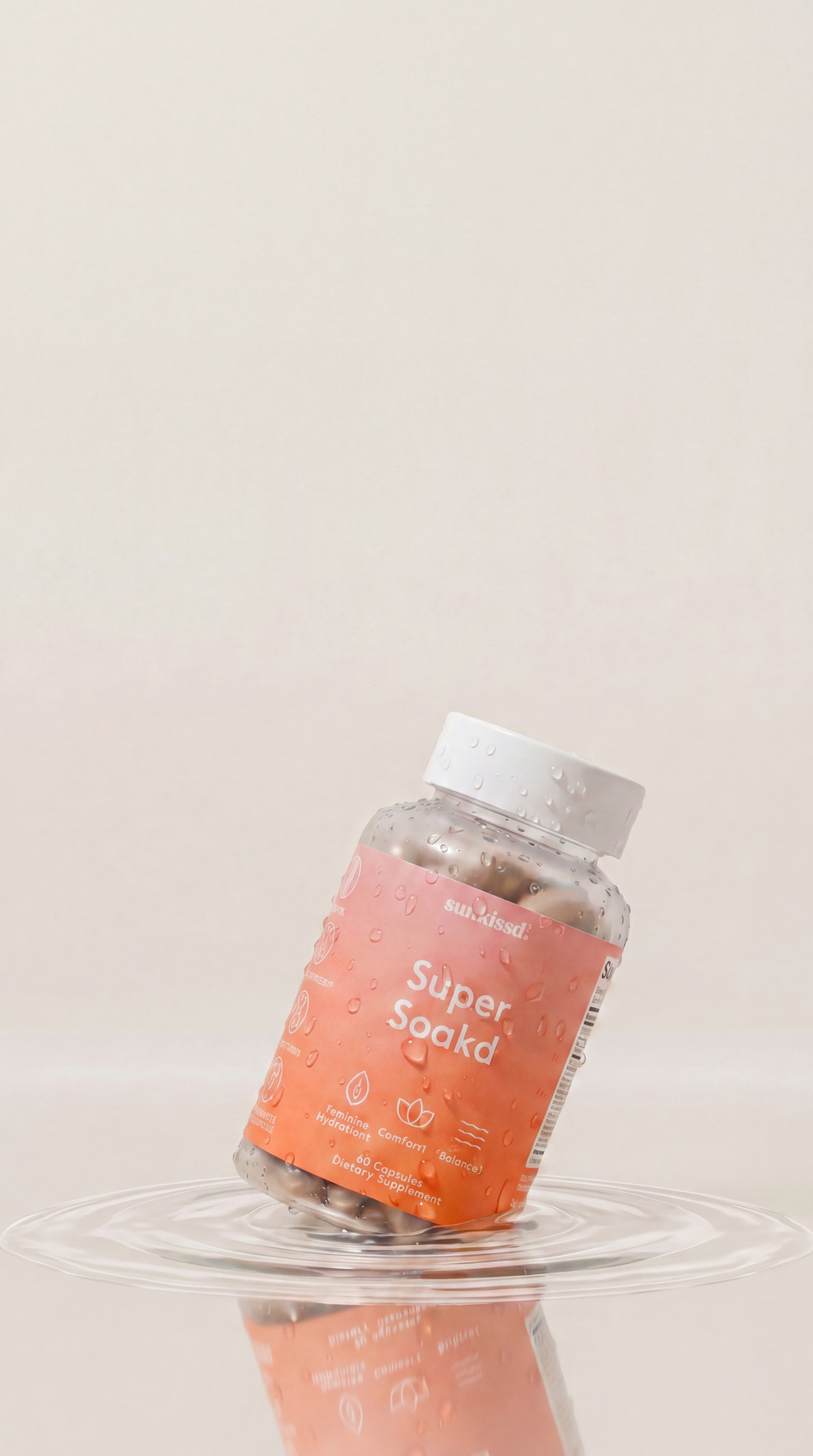 Supplement bottle labeled 'Super Soakd' on a light beige background