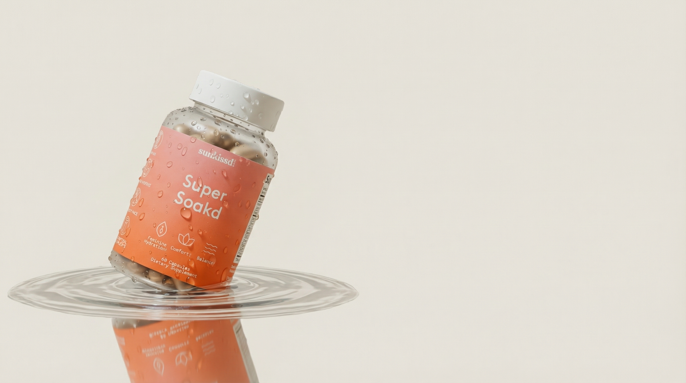 Supplement bottle labeled 'Super Soak' on a clear stand with a beige background